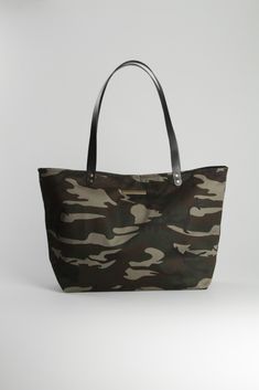 Details:  - Camouflage Tote Bag - Measurements: 32cm high x 49cm wide x 14cm deep - Black inside - Inner pocket - Black leather handles - Handmade in Barcelona   #totebag #camobag #bag #camuflaje #bolsos #handmade #fashion #lagut Khaki Tote Bag With Leather Handles, Coated Canvas Tote Bag With Reinforced Handles, Military Style Rectangular Travel Bag, Coated Canvas Tote Shoulder Bag With Reinforced Handles, Khaki Tote Canvas Bag For On-the-go, Khaki Canvas Tote Bag For On-the-go, Versatile Khaki Canvas Tote Bag, Military Style Satchel Bag For Everyday Use, Military Style Rectangular Bag For Everyday Use