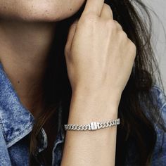 Elevate your look with the Pandora Timeless Pavé Cuban Chain Bracelet. This sterling silver bracelet features sparkling links in a chain. The top of each half circle is set with three round stones, while the back of the chain is polished for shine and comfort. The bracelet closes with a flat, square-shaped clasp featuring an engraved Pandora logo. Combining the linear geometry of our iconic chains with sparkling pavé, this sterling silver chain bracelet is a forever piece with of-the-moment appe Pandora Red, Pandora Pave, Pandora Heart, Bracelet Pandora, Heart Chain, Silver Chain Bracelet, Cuban Chain, Pandora Bracelet, Pandora Jewelry