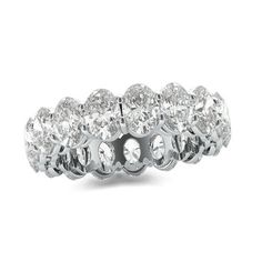 A stunning celebration of your commitment, this fancy-shape diamond eternity band is a confident choice for your bride or bride-to-be. Expertly crafted in sleek platinum, this sensational style showcases sparkling 1/4 ct. oval-cut diamonds - each boasting a color rank of I and clarity of VS2 - that surround the endless band. This breathtaking design is beguiling on its own or paired with her diamond solitaire. Dazzling with 5 cts. t.w. of diamonds and a brilliant buffed luster, this eternity ban Oval Diamond Cut White Gold Eternity Band, Silver Oval Eternity Band With Brilliant Cut, Oval Diamond Cut Eternity Band, Oval Diamond White Eternity Band For Formal Occasions, Silver Oval Eternity Band With Prong Setting, Elegant Oval Eternity Band With Diamond Accents, Oval Cubic Zirconia Eternity Band In White Gold, White Oval Eternity Band Fine Jewelry, Silver Oval Eternity Band With Diamond Accents