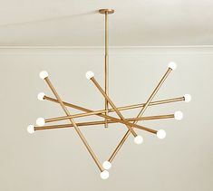 a modern chandelier hanging from the ceiling