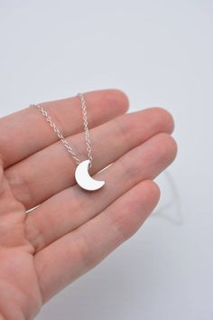 This lovely necklace makes a beautiful, lasting gift. I make this using 925 sterling silver chain and spring clasp. The crescent moon charm is a metal alloy with shiny silver finish and measures approximately 1/2 inch tall. It moves freely along the chain. Comes in a gift box, perfect for gift-giving. This piece looks great when paired with a star necklace. See 5th photo for both necklaces together. Listing is for moon necklace only but star necklace can be purchased here:www.etsy.com/listing/24 Silver Moon Charm Necklace With Adjustable Chain, Silver Crescent Moon Phase Charm Necklace, Silver Crescent Sterling Silver Charm Necklace, Silver Charm Necklace With Moon Charm As Gift, Silver Half Moon Charm Necklaces, Silver Charm Necklace With Moon Charm For Gift, Silver Moon Charm Necklace For Gift, Silver Half Moon Charm Necklace, Sterling Silver Moon Charm Necklace For Gift