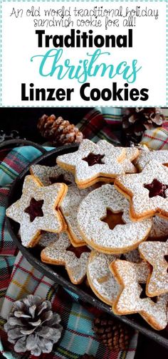 traditional christmas linzer cookies on a platter with pine cones