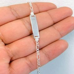 Material: 925 Sterling Silver Length: 6" Inches Thickness: 2.4mm Weight: 2.7 Grams 100% Brand New Material: 925 Plata Pura Longitud: 6" Pulgadas Grosor: 2.4mm Peso: 2.7 Gramos 100% Nuevo Adjustable Silver Chain Bracelet For Birthday, Dainty Silver Engraved Bracelets, Dainty Engraved Silver Bracelet, Classic Silver Name Bracelet For Birthday, Adjustable Silver Name Bracelet With Lobster Clasp, Classic Silver Name Bracelet, Hallmarked, Classic Silver Hallmarked Name Bracelet, White Sterling Silver Hallmarked Bracelets, Dainty Silver Engraved Name Bracelet