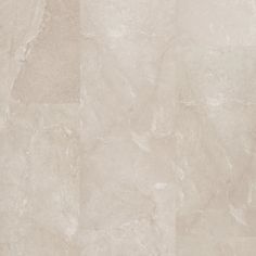 an image of a white marble floor tile textured with light beige tones and patterns