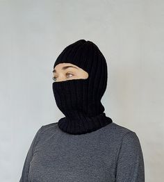 Black Balaclava Face mask - Wool Rib Knit Balaclava - Men's Balaclava - Women's Balaclava Knitted from the highest quality 100% merino wool. Stylish and comfortable accessory will keep you head, face and neck warm in winter season Can be worn as classic balaclava or as beanie with double laple To choose right size you need to do only 1 gauging (as shown on picture).  Colors on photo - Black Possible colors you can see on the last photos of my listing. 01 - white (warm)  02- milky 03 - ecru 04 - Black Balaclava For Cold Weather, Fitted Balaclava Mask For Winter, Solid Color Balaclava For Winter, Fitted Solid Balaclava For Winter, Fitted Full Face Black Balaclava, Black Fitted Full Face Balaclava, Breathable Black Winter Balaclava, Balaclava Knitted, Winter Balaclava Mask