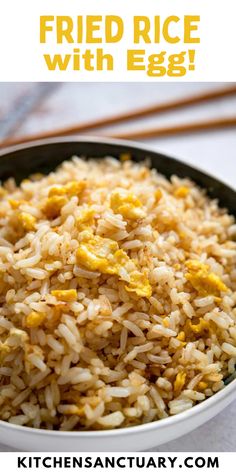 fried rice with egg in a white bowl