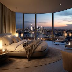 a large bed sitting in the middle of a living room next to a tall window