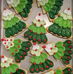 decorated cookies in the shape of christmas trees