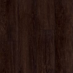 dark brown wood flooring that looks like it has been painted