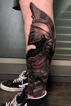 a person with a tattoo on their leg