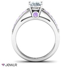 a white gold engagement ring with pink sapphire and diamonds on the side, set in 18k white gold