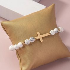 Beautiful Cross Beaded Bracelet Featuring Marble White Beads And Accents Of Small Gold Beads Size 2.4 “ Band Stretches Material- Stone Casual White Beaded Bracelets With Faceted Beads, White Beaded Minimalist Stretch Bracelet, Minimalist White Bracelets With Colorful Beads, White Gemstone Beads Bracelets For Beach, Minimalist White Beaded Bracelet With Faceted Beads, Spiritual White Beaded Bracelets With Colorful Beads, White Casual Beaded Bracelets With Gemstone Beads, Adjustable White Pearl Bracelet With Gemstone Beads, White Rosary Bracelet With Colorful Beads As Gift