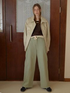 Color: GreenCountry of Origin : Republic of Korea Casual Green Wide Leg Pants For Spring, Olive High-waisted Pants For Spring, Trendy Olive Pants For Spring, Casual Olive Wide Leg Pants With Pockets, Spring Casual Light Green Bottoms, Olive Spring Trousers, Spring Olive Trousers, Green Ankle-length Wide Leg Pants For Spring, Khaki Parachute Pants For Spring