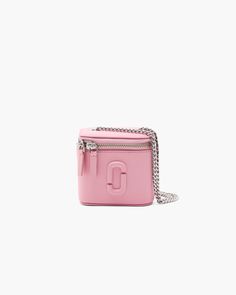 Only the essentials matter with this crossbody Mini Vanity Bag. This elegantly compact evening essential features a two-way zip-around closure, an internal lipstick holder and our signature covered J Marc seal. Featuring an elevated chain strap, style as a shoulder bag or wear as a crossbody for effortless, lightweight travel. Perfect for stashing keys, lipstick, cash and cards. | MARC JACOBS The Mini Vanity Bag in Ribbon Pink Mini Vanity, Pink Vanity, Marc Jacobs Crossbody Bag, Christmas Haul, Purse Essentials, Marc Jacobs Tote, Vanity Bag, Lipstick Holder, Marc Jacobs Bag