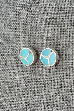 These turquoise and sterling silver earrings were made by Zuni silversmith Lynelle Johnson.Length: 3/8"Width: 3/8"Free shipping on all orders! We ship with USPS and always include tracking. All orders ship within a day of payment.Returns are accepted up to 30 days after you receive your order. Just send us a message. Our shop offers cash back or store credit. The item must be returned in new condition. Instagram Jewelry, Bear Carving, White Buffalo, Pearl Chain, Turquoise Sterling Silver, White Vintage, Sterling Silver Earrings, Silver Earrings, Jewelry Gifts