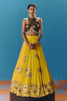 Yellow attached cancan lehenga with geometric sequin embroidery in pixel floral pattern. Paired with pearl border criss -cross blouse and an embroidered dupatta. - Aza Fashions Yellow Lehenga With Sequins For Festive Occasions, Yellow Sequined Lehenga For Diwali, Yellow Sequined Choli For Navratri, Yellow Anarkali Choli With Sequins, Yellow Sequined Choli For Diwali, Yellow Sequined Lehenga For Party, Party Yellow Sequined Lehenga, Yellow Sequined Choli For Party, Party Yellow Lehenga With Sequins