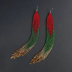 Red green gold fringe earrings Shoulder duster earrings Long | Etsy Festival Gift Tassel Dangle Earrings, Handmade Red Chandelier Earrings For Festivals, Bohemian Christmas Earrings For Festive Occasions, Bohemian Red Jewelry For Christmas, Festive Dangle Tassel Earrings With Beads, Red Bohemian Jewelry For Christmas, Bohemian Christmas Jewelry, Festive Tassel Earrings With Dangling Beads, Handmade Festive Drop Tassel Earrings