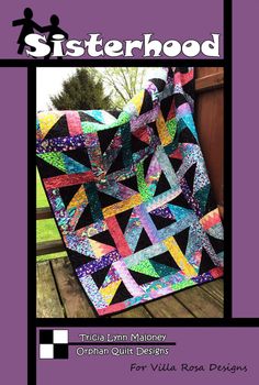 the cover of sisterhood quilt book