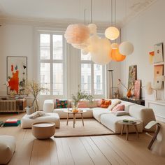 a living room filled with lots of white furniture