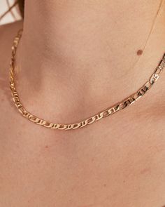 Feeling bold? Our Mariner chain is the perfect way to add interest and shine. This chain is lightweight, easy to wear, and always adds some "wow" factor. This chain comes in 16" and 18" length options and is made from 14k gold-plated recycled brass. Trendy Figaro Chain Link Jewelry, Everyday Figaro Chain Link Necklace, Everyday Figaro Chain Link Jewelry, Everyday Jewelry With Figaro Link Chain, Everyday Figaro Link Chain Jewelry, Everyday Oval Link Figaro Chain Necklace, Delicate Cuban Link Chain Necklace For Everyday, Trendy Figaro Chain Link Necklace, Everyday Gold Plated Figaro Chain Necklace