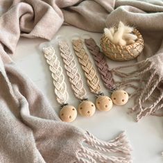 several wooden beads are laying on a blanket