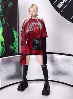 Edgy layered top featuring bold red and black horizontal stripes. Main design showcases a rebellious cat face graphic and graffiti-style text. Unique dual-sleeve effect with short striped sleeves and long black sequined sleeves for added texture. Crescent moon symbols adorn the striped sleeves. The oversized fit and mix of patterns create a striking punk-inspired look. Model info Height: 174cm Weight: 46kg Wearing size: S Taobao Brands, Punk Cat, Punk Cats, Moon Symbols, Punk Inspiration, Angel Dress, Striped Sleeve, Horizontal Stripes, Long Tshirt