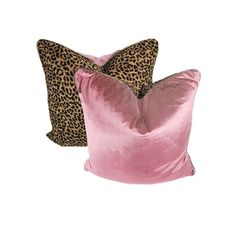 two pink and brown pillows with leopard print on the front, one is made out of velvet