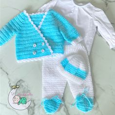 White and blue. Baby set (shirt pants and coat) hand knitted. White Knitted Long Sleeve Set, Fitted Crochet Blue Cardigan, Fitted Blue Crochet Cardigan, Fitted Knitted Cotton Sets, Baby Boy Clothing Sets, Baby Set, Blue Baby, Clothing Sets, Boys Clothing