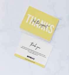 two business cards with the words thank you written on them, one in yellow and white