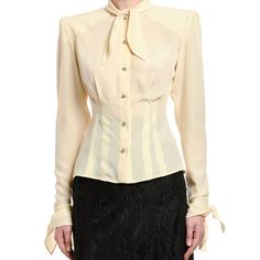 Dolce & Gabbana Blouse In Georgette. Tied Neckline; Jeweled Button Front. Padded Shoulders. Long Sleeves; Tie Cuffs. Darted Waist. Slim Fit. Shirttail Hem. Silk. Made In Italy. Ankle Length Skirt, Leopard Print Shirt, Dolce Gabbana Dress, Tie Neck Blouse, Twill Shirt, Flutter Sleeve Top, Lace Shirt, Button Front Shirt, Tie Neck