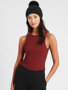 RIBBED KNIT: So soft, so stretchy, our micro-ribbed cotton jersey has been specially washed for an ultra-soft feel.  FITTED: Expertly tailored for a sporty, sleeveless silhouette that can still cover bra straps.  SHORT LENGTH: Designed to wear with mid-rise and high-rise styles.  Crew neck.  Straight hem.  Fitted.  Short body length - great with mid-rise and high-rise styles.  Body length (size S): Regular 23" Model: Size XS, 5'10" (178cm). Ribbed Sleeveless Top With Medium Support, Casual Tank Top With Built-in Bra And High Stretch, Everyday Fitted Ribbed Tank Top, High Stretch Ribbed Tank Top, High Stretch Ribbed Scoop Neck Tank Top, High Stretch Ribbed Tank Top With Scoop Neck, Sporty High Stretch Ribbed Tank Top, Casual Seamless Elastane Tank Top, High Stretch Seamless Tank Top For Everyday