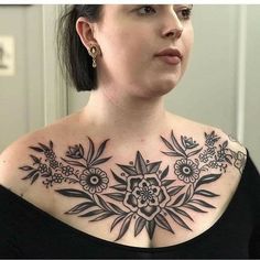 a woman with a tattoo on her chest