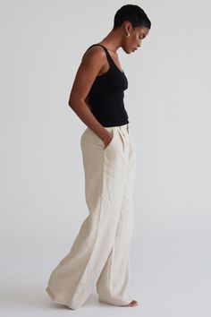 Elevate your summer style with these stylish linen trousers. Designed with elegance in mind, our tailored pants feature a high waist with an elasticated back, a straight leg, side pockets, and belt loops. Perfect for any occasion, these timeless pants are a must-have for every wardrobe. Wide Leg Linen Pants, Linen Trousers, Tailored Pants, Dress Trousers, Signature Collection, Linen Pants, Square Neckline, Summer Style, Knit Top