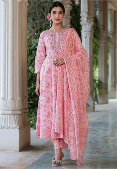 Readymade Pure Cotton Anarkali Kameez in Pink This Round Neck and Quarter Sleeves attire is Enhanced with Floral and Zig Zag Print Available with a Pure Cotton Pant in Pink and a Pure Cotton Dupatta in Pink The Kameez and Bottom Lengths are 42 and 38 inches respectively Do Note: Accessories shown in the image are for presentation purposes only and length may vary upto 2 inches.(Slight variation in actual color vs. image is possible). Cotton Anarkali Suits, Vs Image, Cotton Anarkali, Kameez Designs, Embroidered Anarkali, Kurta Style, Trouser Design, Zig Zag Print, Anarkali Kurta