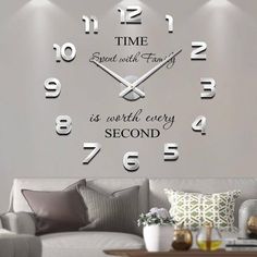 a living room wall clock with the words time spent with family is worth every second