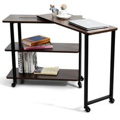 a computer desk with books and a laptop on it's side shelf, against a white background