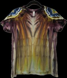 One-of-kind handmade ice-dyed and/or liquid-dyed piece. Women's Next Level Apparel XL Fitted 100% combed ringspun cotton fine jersey T-shirt. Fiber reactive dyes are used, along with soda ash and professional textile detergent.   The tie-dye process includes washing articles multiple times in hot water. Some shrinkage may occur.  Dyes are made of several different colors and may show a dominant color as a spot or a streak. It's what makes each piece unique and one-of-a-kind. All handmade tie-dye Hand Dyed Acid Wash T-shirt For Festivals, Summer Acid Wash Hand Dyed T-shirt, Grunge Soft-washed Tie Dye T-shirt, Tie-dye Hand-dyed Short Sleeve T-shirt, Hand Dyed Tie-dye Short Sleeve T-shirt, Next Level, In Hot, Brilliant Colors, Tie Dye