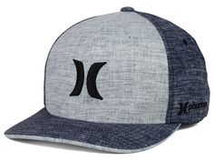 a baseball cap with an x on the front, and a black logo on the back