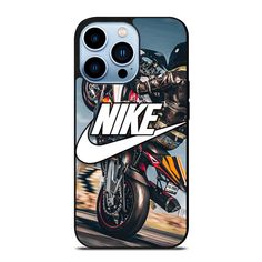 a phone case that has a photo of a man riding a motorcycle on the road