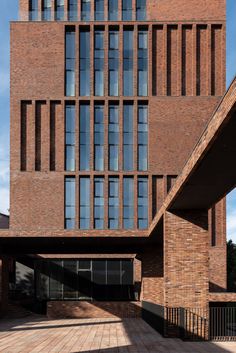 a large brick building with lots of windows