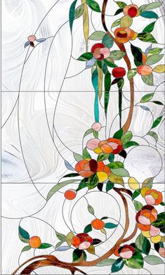 an artistic stained glass window with flowers and leaves on it's sides, in the shape of a tree