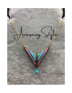 This listing is for a beautifully crafted beaded necklace. Made using teal, blue, pink, and a stunning tear drop bead. 18" gold toned chain and easy to use clasp. Add this wonderful creation to your next style. Triangle dimensions ~2x2x1/2 inch Please contact me with any questions Multicolor Teardrop Drop Necklace For Gift, Multicolor Beaded Teardrop Necklace, Gold Teardrop Beaded Necklaces For Jewelry Making, Teardrop Beaded Necklace As Gift, Handmade Turquoise Drop Necklaces, Gold Teardrop Beaded Necklaces With Dangling Beads, Handmade Turquoise Drop Necklace, Teardrop Faceted Bead Necklace For Gift, Gold Teardrop Beaded Necklace With Dangling Beads