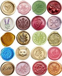 many different types of wax seals with flowers and leaves on them, all in different colors