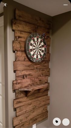 a dart board mounted to the side of a wall