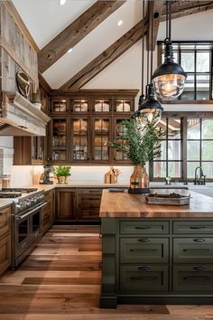 a large kitchen with wooden cabinets and an island in the middle, along with wood flooring