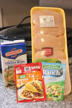 the ingredients for this meal include chicken, rice and other foods in front of an electric pressure cooker