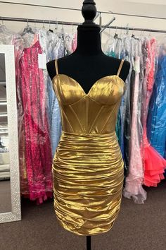 This dress is made of spandex material and features a beautiful gold color. The sheath silhouette, spaghetti straps, and ruched skirt add elegant details. With an above-the-knee length and a convenient zip-up back, this dress is both stylish and comfortable. SKU: 3667 Spandex material Gold color Sheath silhouette Spaghetti straps Ruched skirt Above knee length Zip-up back Highly suggest custom size for plus size. Ship in 7-10 business days. We offer free returns in 7 days. Please refer to our re Bodycon Dress Homecoming, Burgundy Prom Dress, Corset Bodice, Ruched Skirt, Formal Party Dress, Short Prom Dress, Luxury Wedding Dress, Dress Picture, Homecoming Dress