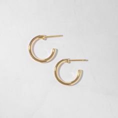 Beautiful dainty diamond hoop earrings that can be worn alone for a pop of bling, or paired with huggies! They're the perfect size and lightweight, great for any occasion :) Made of 925 Sterling Silver THICK plating of 14k Gold or Rhodium Inner diameter: 12mm; Outer diameter: 16mm 2mm thick Sold as a PAIR Made of highest quality cubic zirconia VERY HIGH QUALITY Nickel-free & Hypoallergenic - great for sensitive ears! Super light-weight Earrings on Model: Pavé Huggies 🎁 Comes in a gift-box, read Trendy Small Hoop Sterling Silver Huggie Earrings, Trendy Small Hoop Huggie Earrings In Sterling Silver, Dainty Small Hoop Huggie Earrings For Everyday Use, Trendy Sterling Silver Small Hoop Huggie Earrings, Trendy Yellow Gold Hoop Earrings For Anniversary, Classic Hoop Huggie Earrings For Everyday, Simple Huggie Hoop Earrings With Ear Wire, Dainty Everyday Small Hoop Huggie Earrings, Everyday Huggie Hoop Earrings