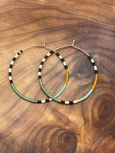 Gold filled 14/20 (not plated) beaded color block hoop earrings. Earrings measure 40 mm. *All orders come gift wrapped Earring Business, Gold Filled Hoops, Hoop Earrings Gold, Beaded Hoop Earrings, Beaded Hoops, Seed Bead Earrings, Beaded Necklaces, Bead Earrings, Jewelry Earrings Hoops