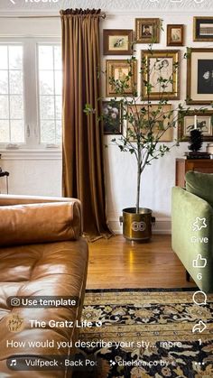 a living room filled with furniture and pictures on the wall